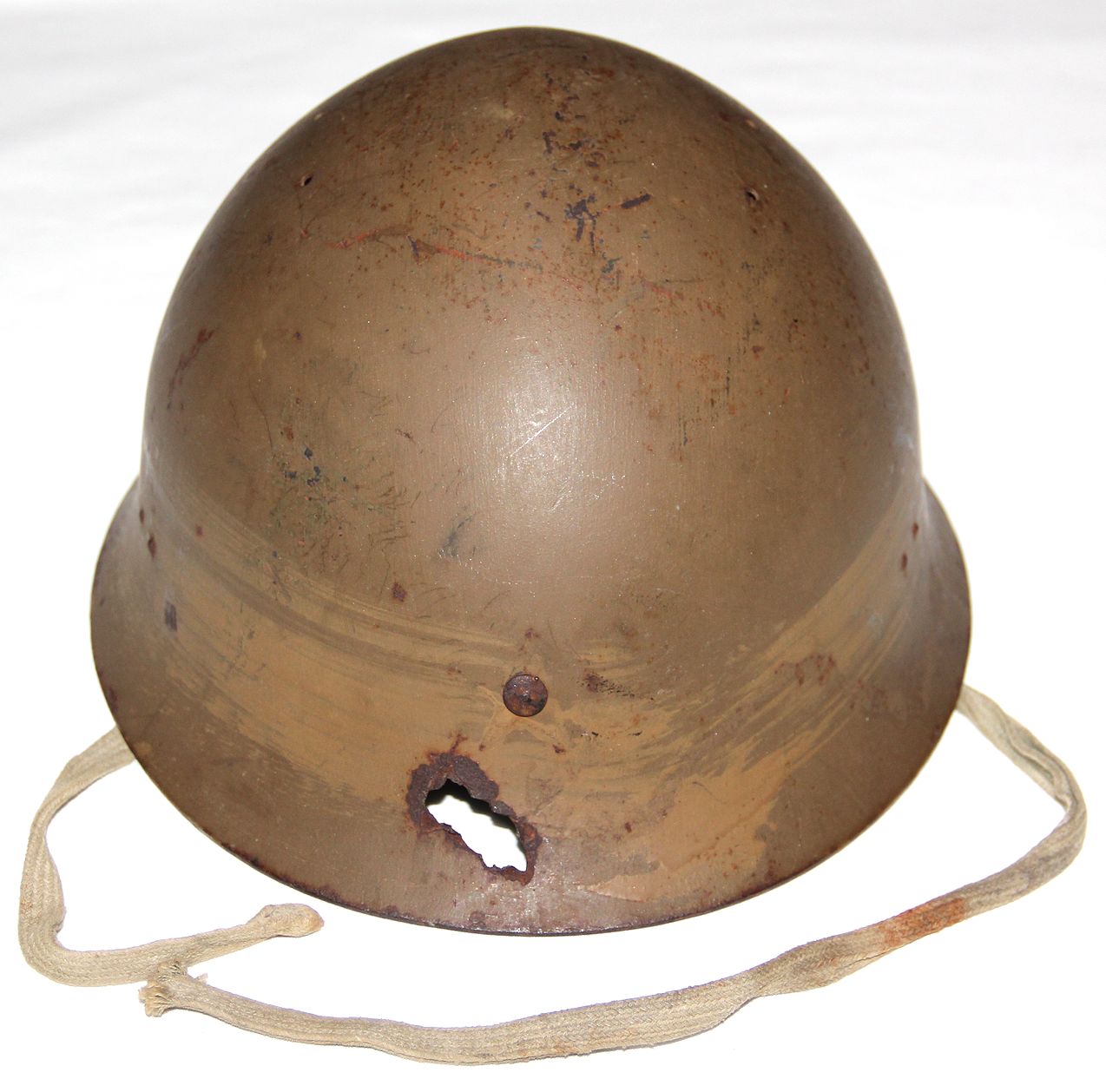 L057. WWII JAPANESE ARMY HELMET WITH SHRAPNEL DAMAGE B & B Militaria